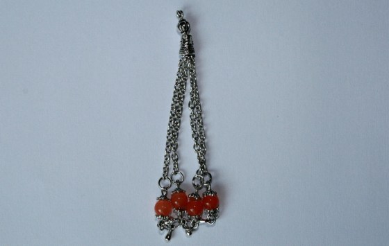 Zottelanhänger mit orangenKatzenaugen, 7,5 cm